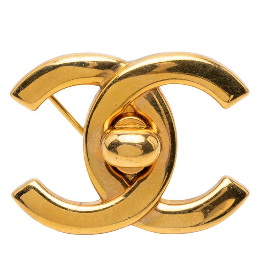 CHANEL Gold Logo Brooch